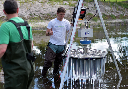 Men utilizing a mat of ecoSPEARS spikes