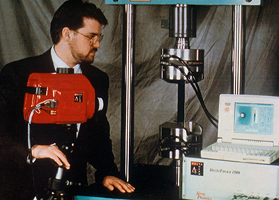A man operating the Delta 1000 stress measurement system