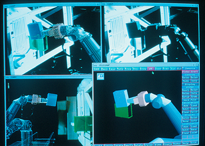 Video images of the real world environment (upper right) and the computer's interpretation of the same scene using TELEGRIP