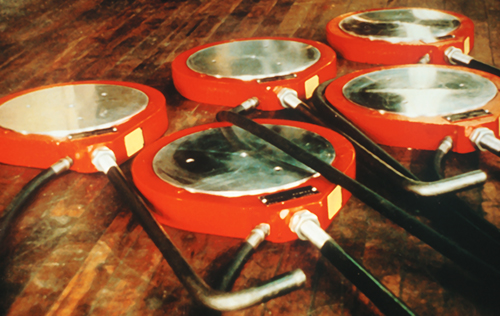 A group of Dudgeon 700-ton load cells/hydraulic jacks