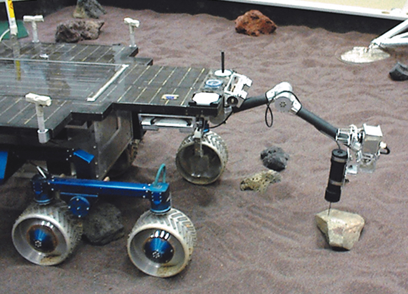 Flight model of the ultrasonic drill attached to a space rover