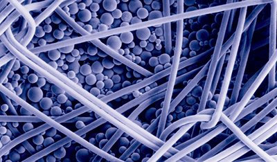 An electromicrograph shows the microencapsulated phase change materials in the insulation