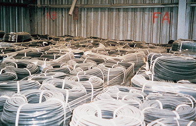 Agricultural hoses in a warehouse