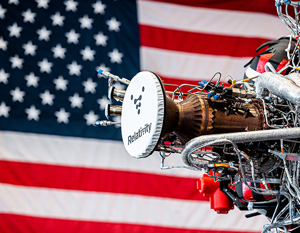 Relativity Space engine in front of American Flag