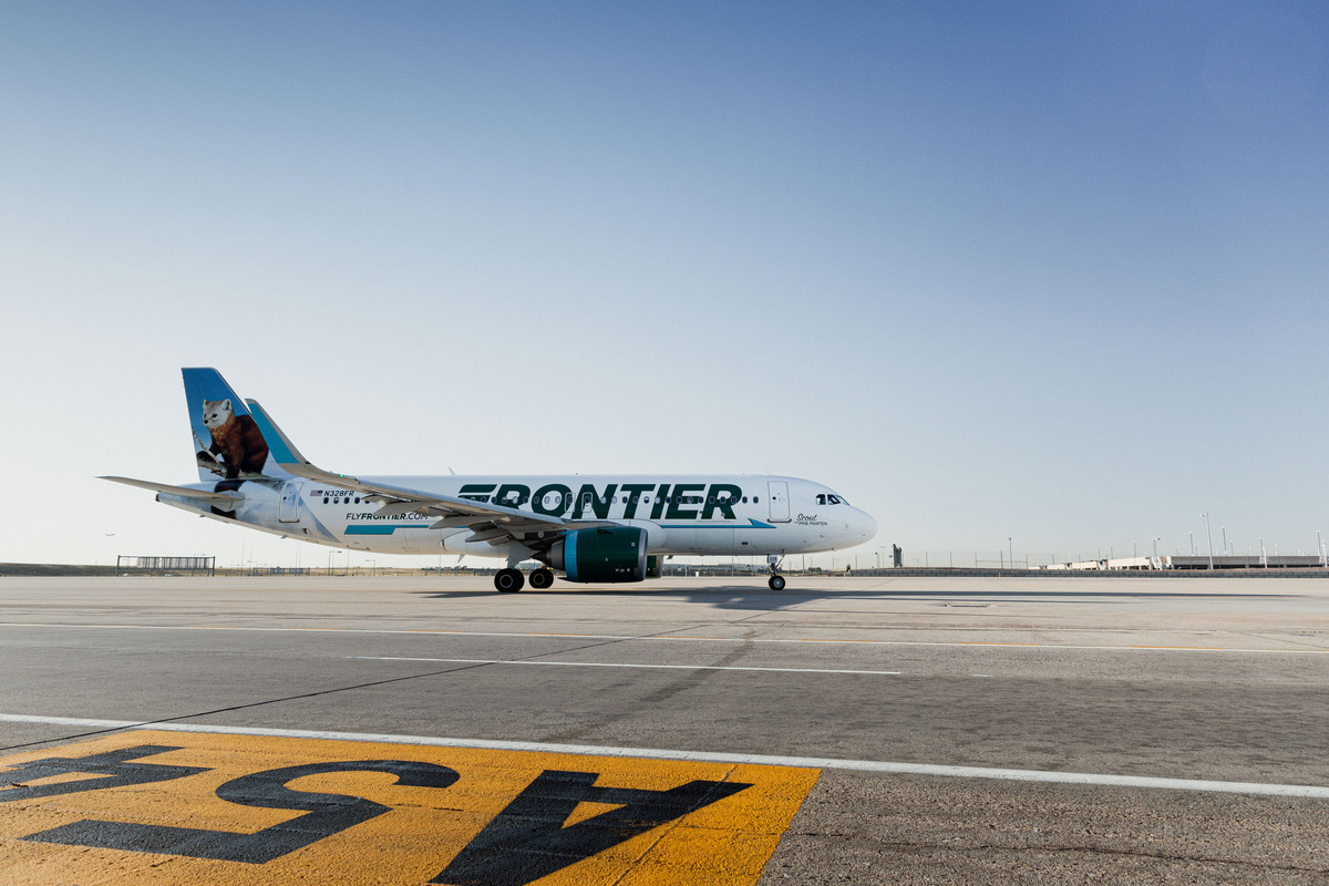 Frontier Airlines passenger plane on runway