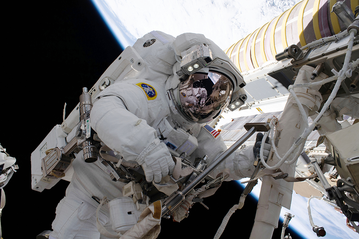 NASA spacewalker Shane Kimbrough is pictured during a spacewalk to install new roll out solar arrays on the International Space Station's Port-6 truss structure