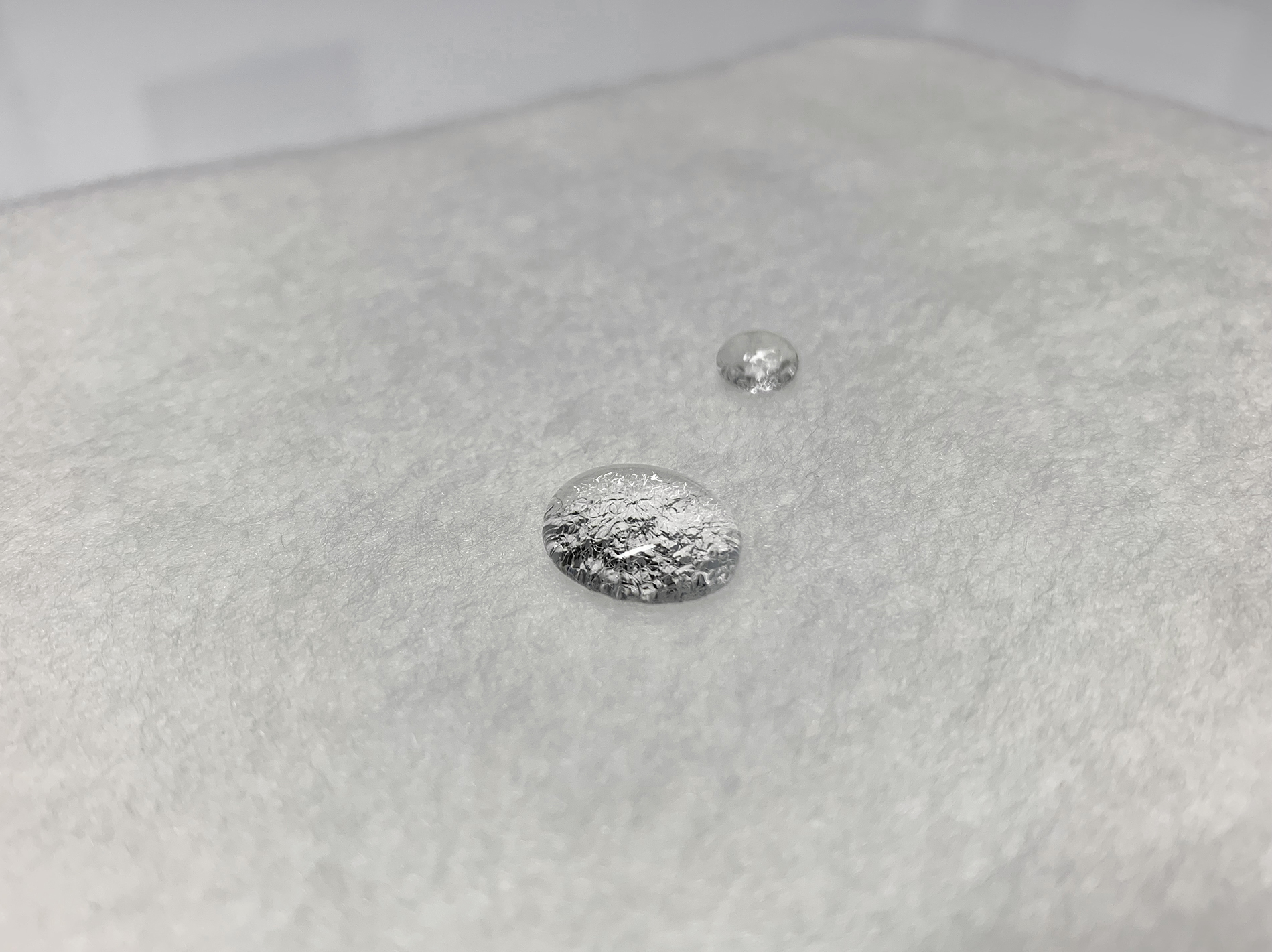 Water droplets on top of Lanaco filter material