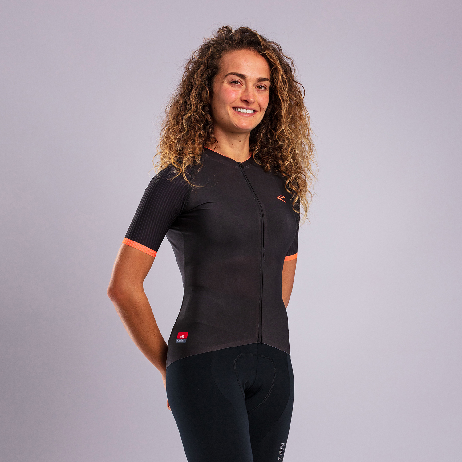 Woman wearing cycling shirt and leggings 