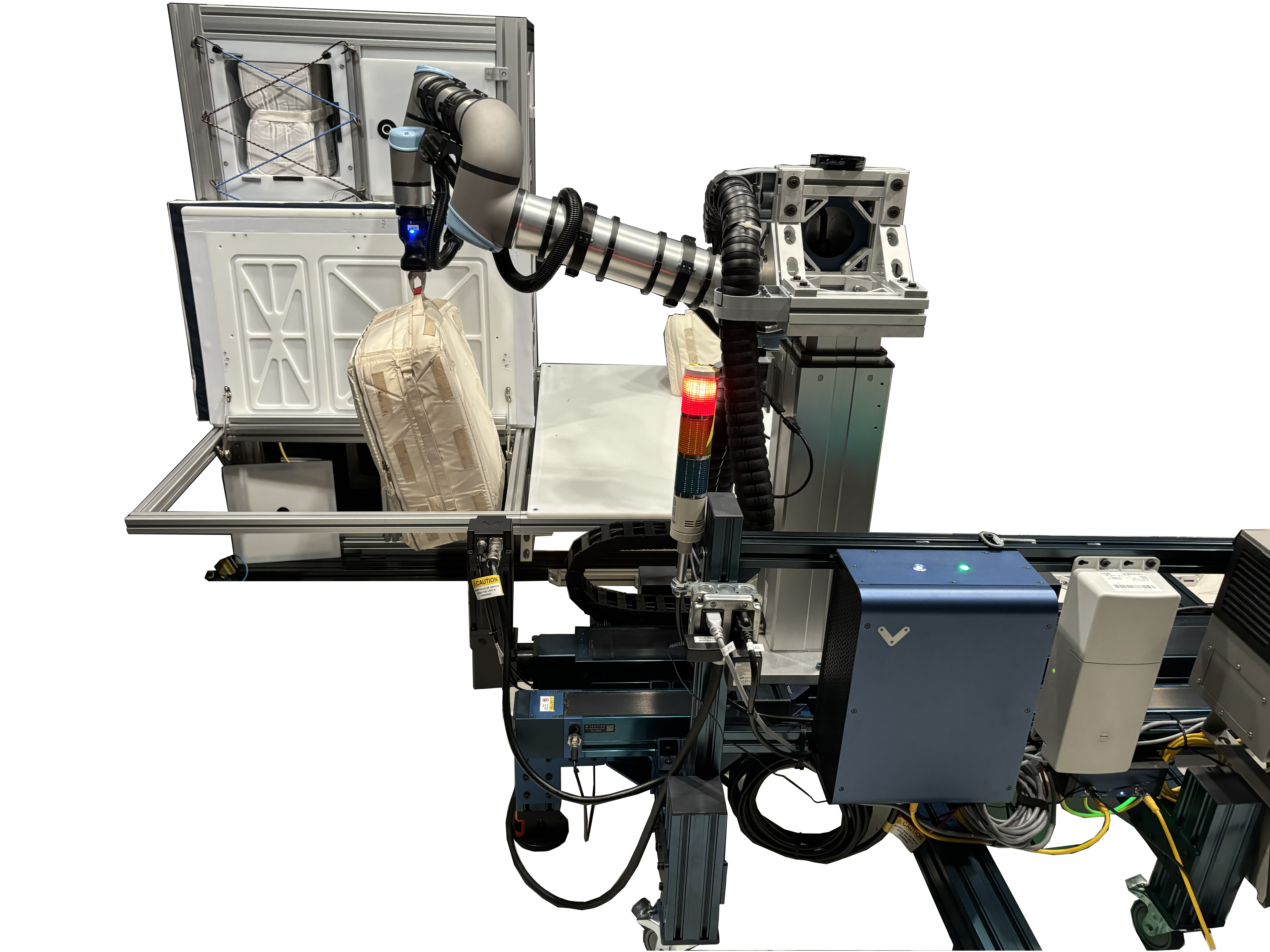 A machine with a robotic arm grabs a bag