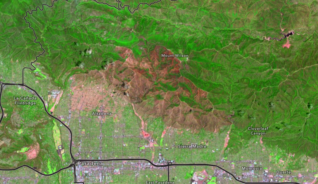 Satellite image of the Mount Wilson area above Pasadena, showing green vegetation and brown burn scars in the San Gabriel Mountains.