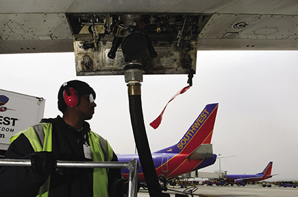 Mechanic fueling plane