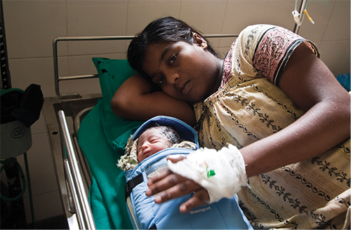 Woman with newborn child