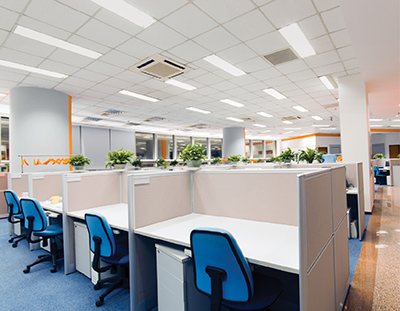 Cubicles in an office lit by BiOS Lighting SkyBlue interior LED bulbs