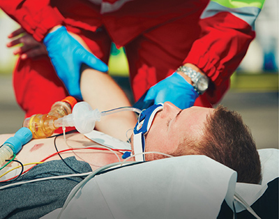 Paramedic with intubated patient
