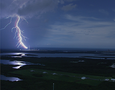 Lightning strikes near a Cape Canaveral launch pad