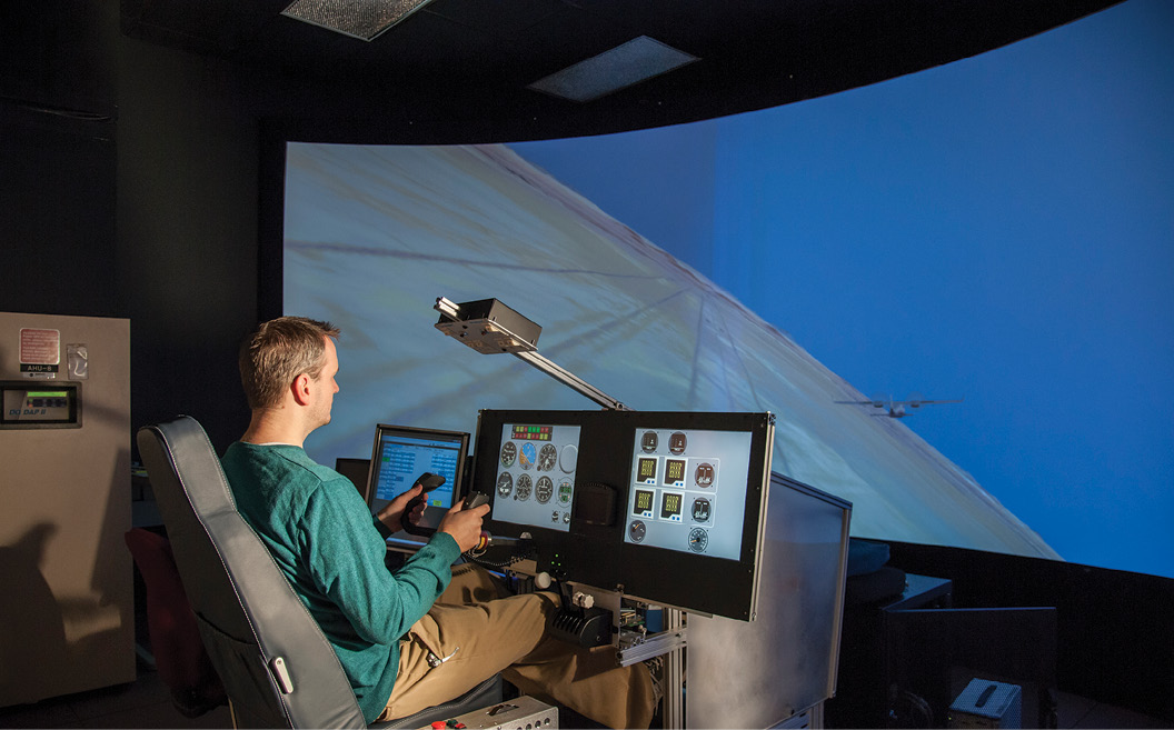 A pilot using a flight simulator
