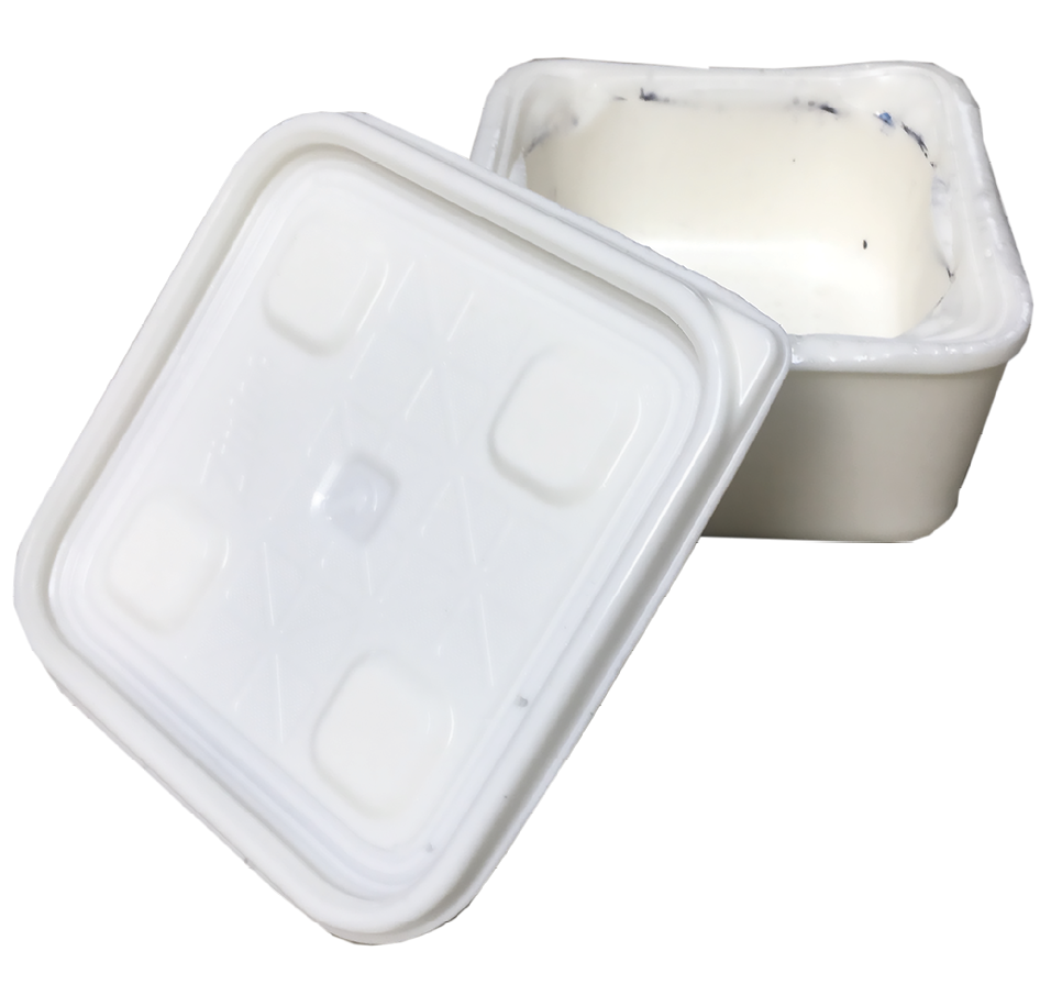 White container with lid askew