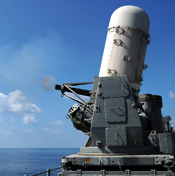 A Phalanx gun fires from the deck of a ship