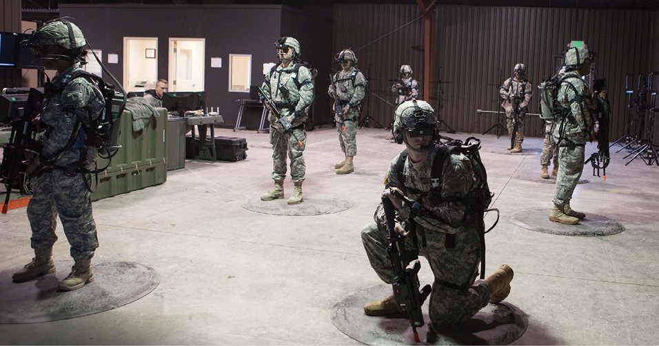 Troops wearing virtual reality gear prepare for training