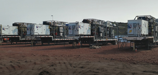 A row of Flarecatcher units on a field