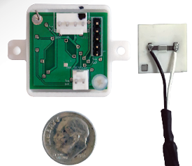A sensor with wires, an image of the reverse side of the sensor with a microchip, both next to a dime for scale