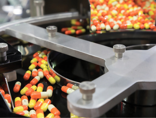 Pill capsules passing through a sorting machine