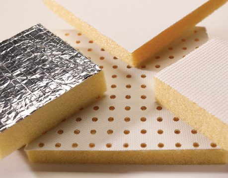 Four rectangular pieces of foam insulation lined with different materials