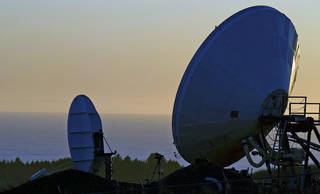 Two telecommunications satellites