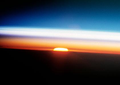This cross section of the Earth's atmosphere at sunset displays an unusual layering believed to be caused by temperature inversions. Credit: NASA A cross section of the Earth's atmosphere at sunset