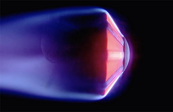 IFOS’s fiber optic thermal sensors were designed to be embedded in heat shields for testing at the Ames Arc Jet Facility (pictured), but their extreme heat resistance makes them perfect for use in semiconductor manufacturing. Credit: NASA Ames Video Group Testing at the Ames Arc Jet Facility