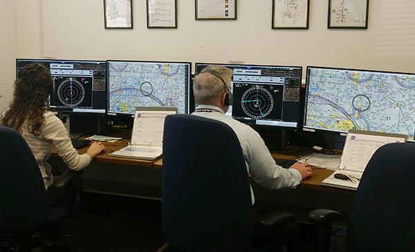 Samantha Smearcheck, then of CAL Analytics, and Bridger Newman, of the Air Line Pilots Association, during NASA Langley flight testing