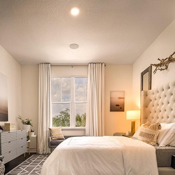 A bedroom with Healthe adjustable LED circadian rhythm lights