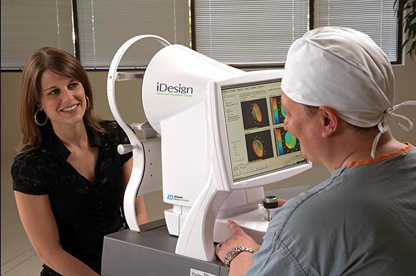 A doctor and patient use a laser vision product
