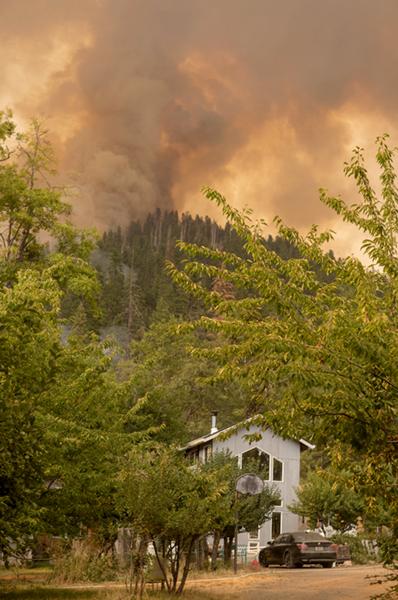 A fire nears homes in California