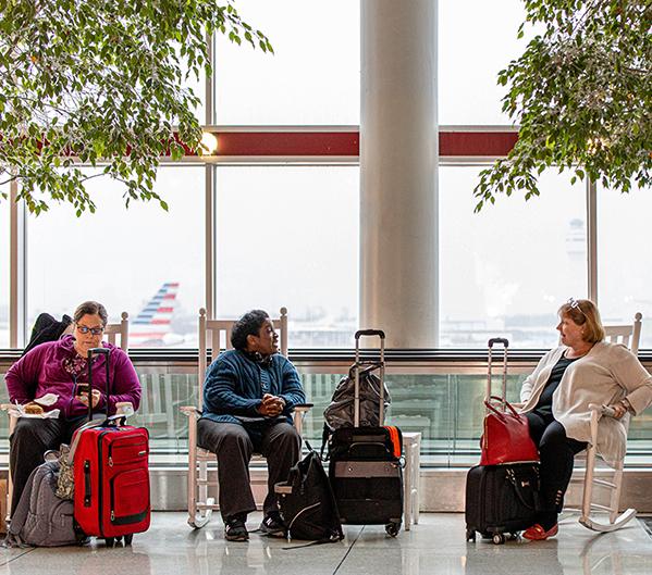 Passengers wait in the terminal