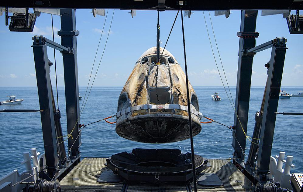 The scorched SpaceX Crew Dragon Endeavour capsule is lifted out of the Gulf of Mexico after safely carrying NASA astronauts Robert Behnken and Douglas Hurley from the International Space Station back through Earth’s atmosphere in 2020. To ensure the capsule’s safety and durability under stresses like liftoff and atmospheric reentry, SpaceX engineers used NASGRO software to predict the behavior of any possible cracks or damage to the structure. NASA invented NASGRO to evaluate the world’s first reusable spacecraft, the space shuttle. Credit: NASA The scorched SpaceX Crew Dragon Endeavour capsule is lifted out of the Gulf of Mexico