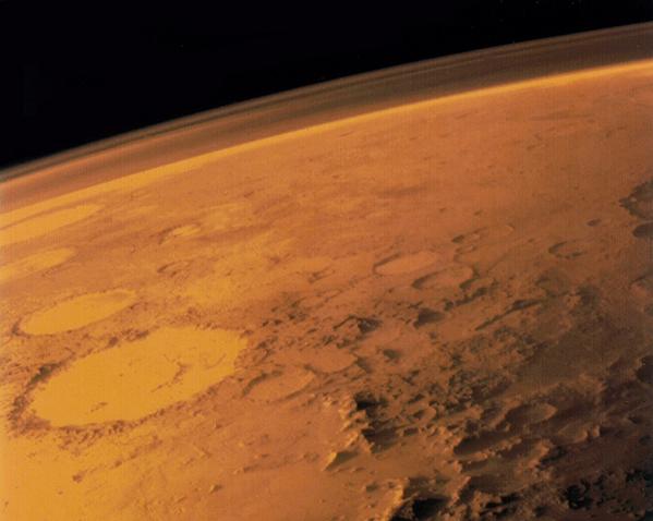 NASA’s Jet Propulsion Laboratory pioneered radio occultation in the 1960s, with the help of Stanford University, to gain the first information about Mars’ thin atmosphere by analyzing signals from the Mariner IV space probe after they had passed through the Martian air. Credit: NASA The surface of Mars