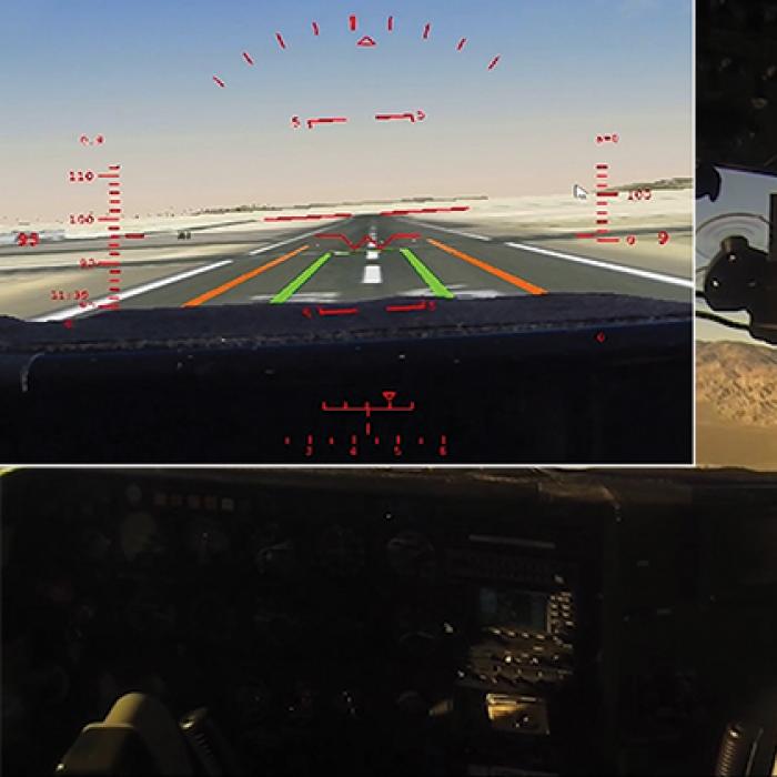 Pilot flies over mountains with a virtual runway superimposed