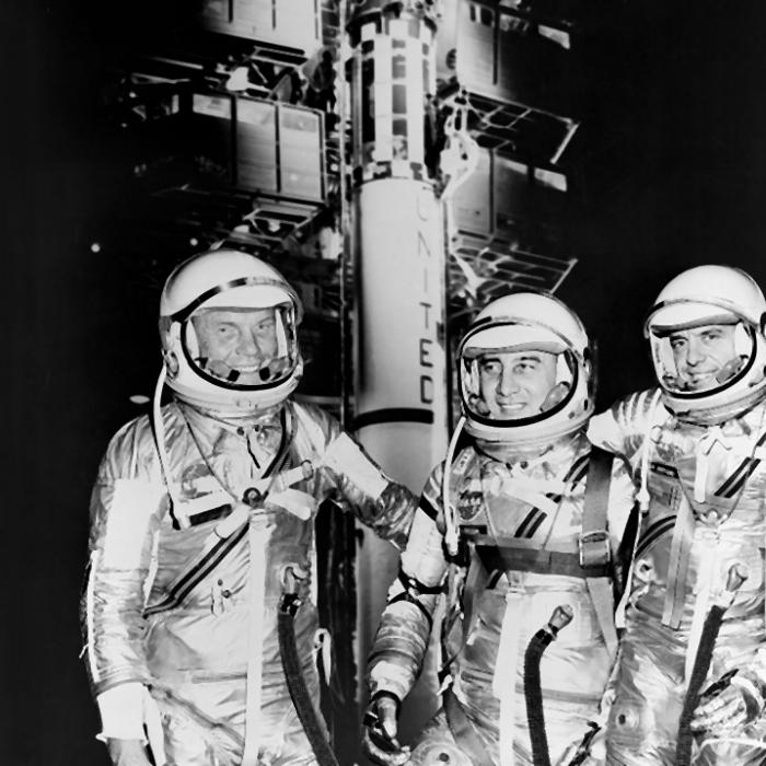 Astronauts John Glenn, Gus Grissom, and Alan Shepard in their spacesuits