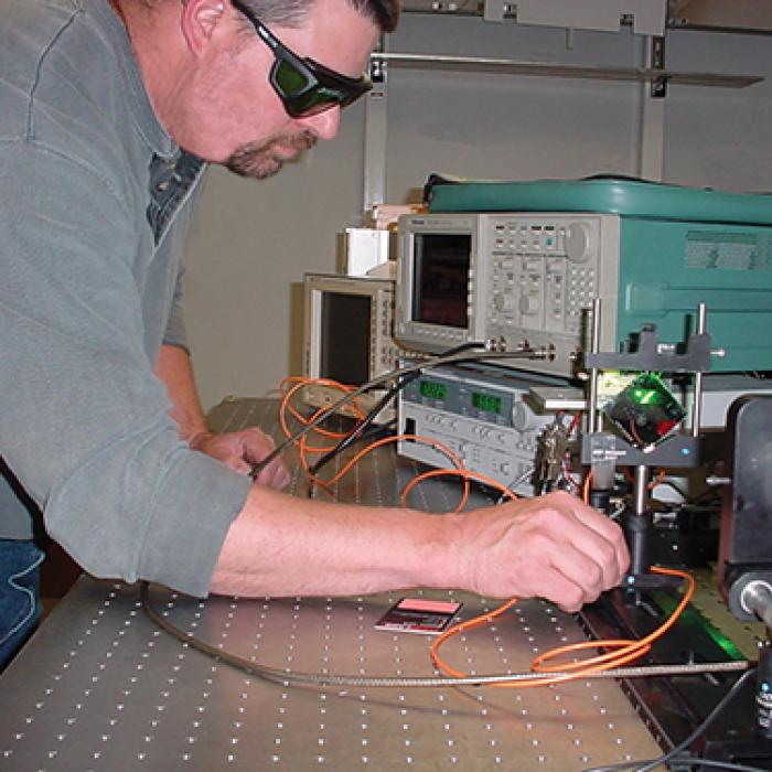 An engineer works with a machine that measures air data