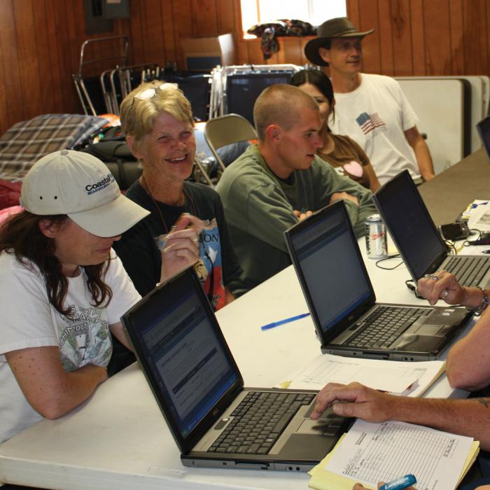 Group of people using internet during an emergency