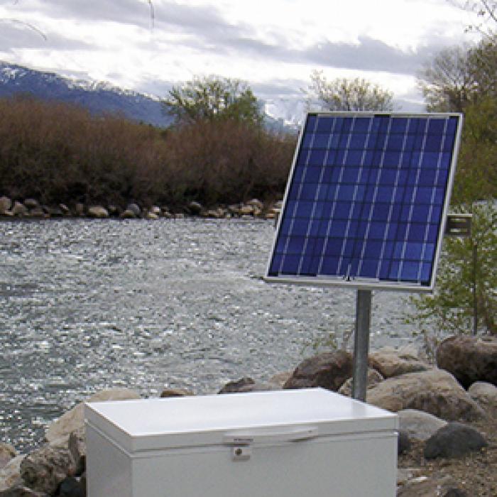 SunDanzer solar-powered refrigerator outside in cloudy weather