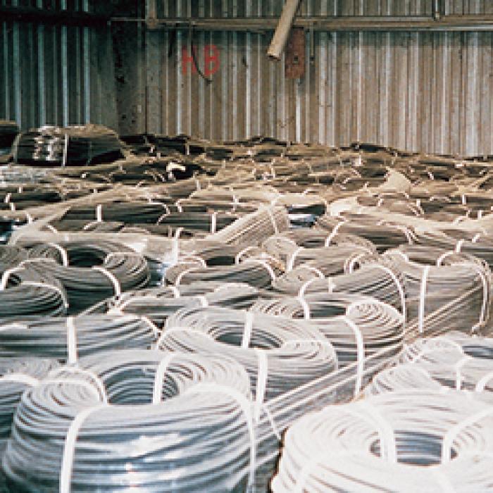 Agricultural hoses in a warehouse
