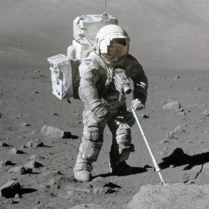 Apollo astronaut collects samples on the Moon