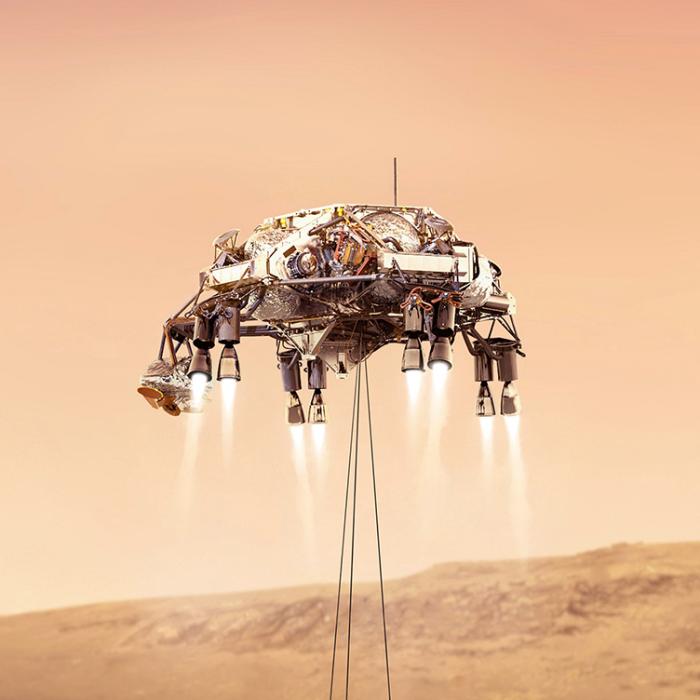 The sky crane landing systems descends toward Mars with the Curiosity rover