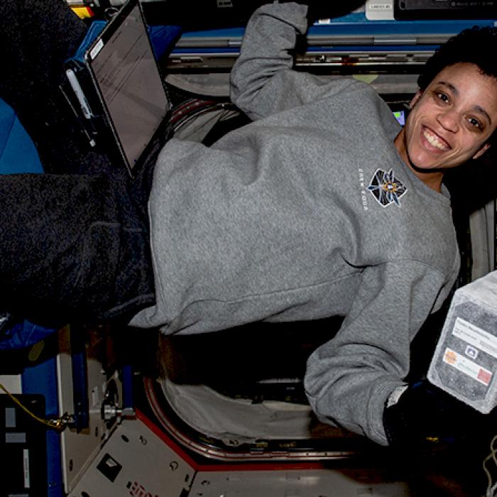 Astronaut Jessica Watkins holds a Nature’s Fynd bioreactor on the International Space Station