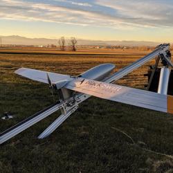 The Black Swift S2 drone in a field