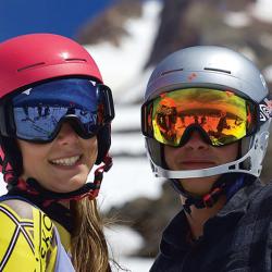 Skiers wearing protective lenses
