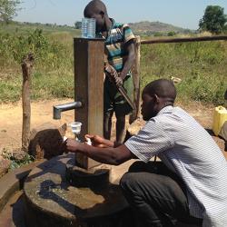 People collecting water samples for testing