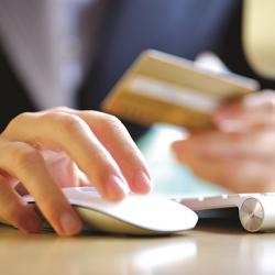 SHINE, an artificial intelligence program NASA designed to monitor the health of space systems, is now being used to determine the intent and sentiment of Internet users to better target advertising. Woman with credit card and computer mouse